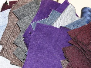 Patchwork Squares -Attempting to turn some old jeans, wool skirts and a coat into a blanket for the sofa...160 squares down, another 65 to go!