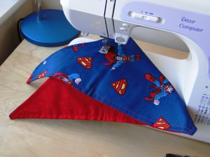 Superman dog neckerchief. Is it a bird? is it a plane? No, its a dapper Daschund!